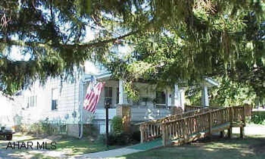 Newer gas fha furnance with central air - Newer wiring and hot water tank - 1st floor bath and bedroom - Attached garage.