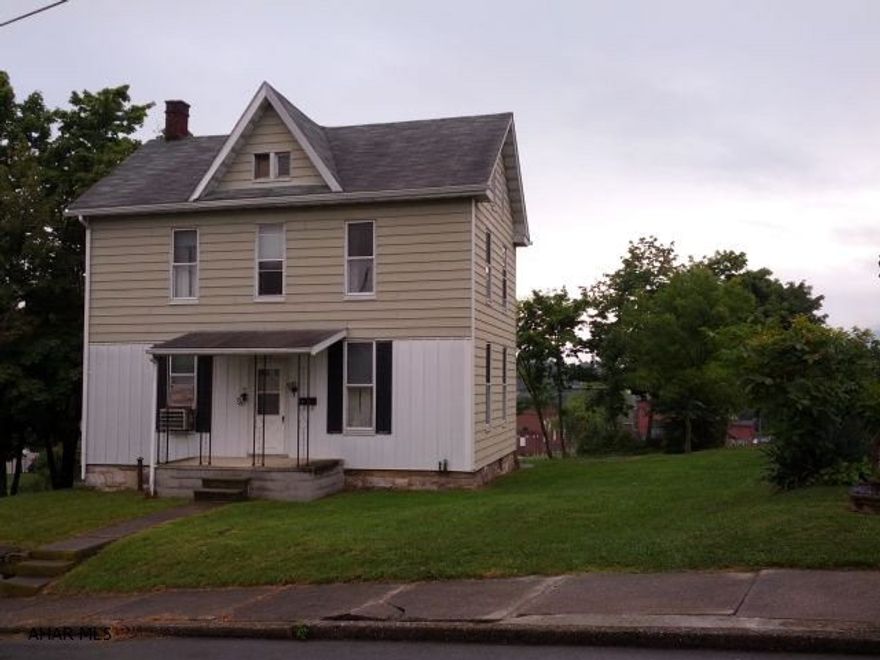 Handy-Man Special. Aluminum sided, 3 bedroom, 1.5 bath home on large lot. Two furnaces (oil + wood/coal furnace).  #J-209