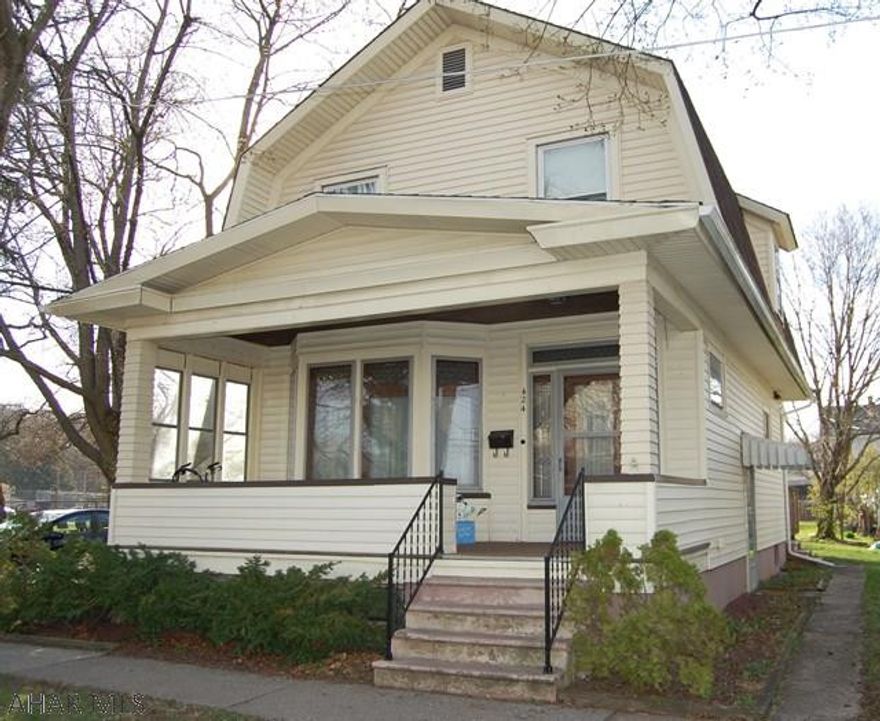 Don't wait on this move-in ready 3 bedroom, 1 bath home that sits on a double lot in a desirable area of Bellwood School District.  Beautiful hardwood floors in the Living and Dining Room with original stained glassed windows.  Alley-style Kitchen with granite counter-tops and large mud room.  House is completely painted and ready for the next owner to move in.  Large composite deck that overlooks a nice concrete patio with natural stone accent.  Area for a garden behind the garage.  Call today for a private tour.