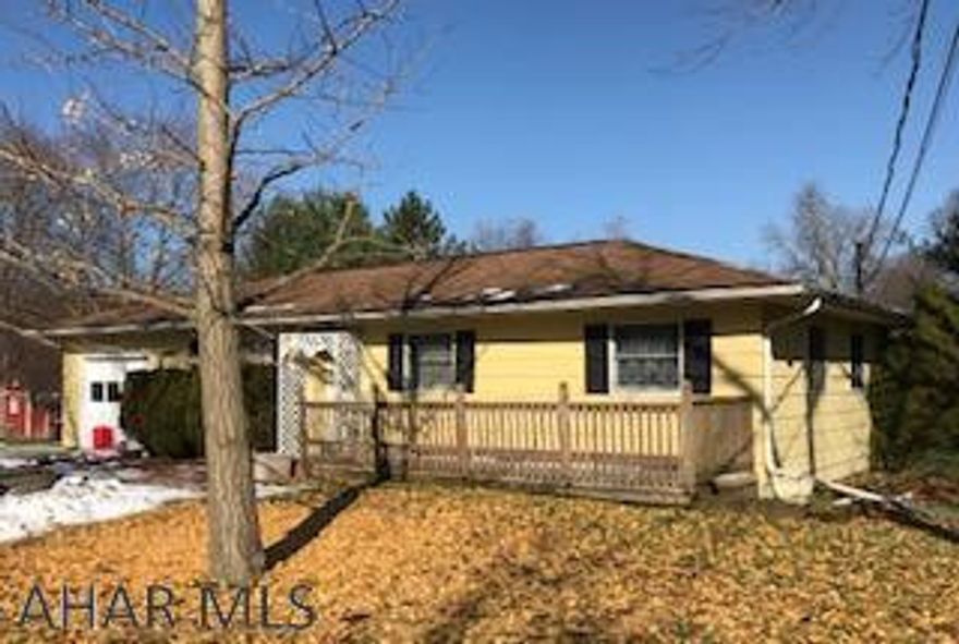 A one story, three bedroom on a double lot - .57 acres.  Updated eat in kitchen with oak cabinetry, soap stone counters and includes stainless steel appliances.  Large deck and a very nice view of private back yard.  Convenient location - close to Route 220, located in Greenwood.  Basement is unfinished but has potential for family room.  Seller is selling "as is" and will not do any repairs. Property is being surveyed by Keller Engineers mid Jan 2019.  A new access road has been put in as of 3/2019.