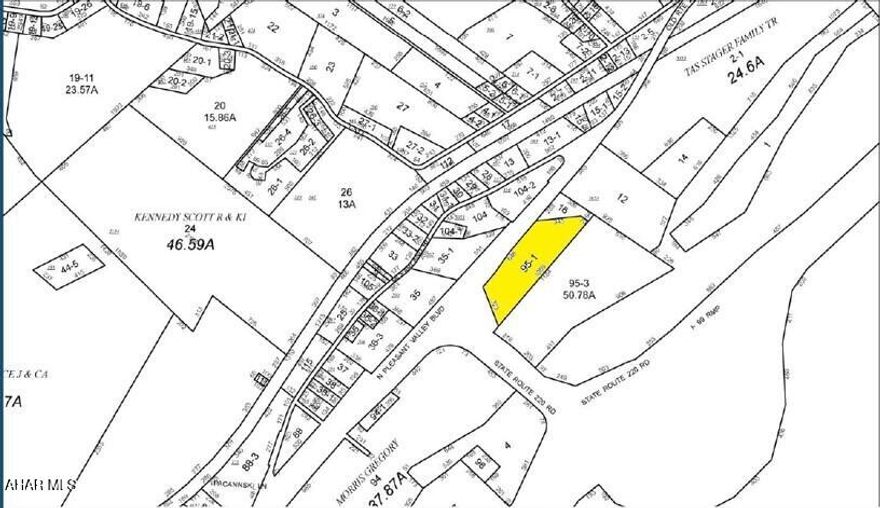 4 acres of ground directly off I 99. Take a look and see if this could be your next investment.