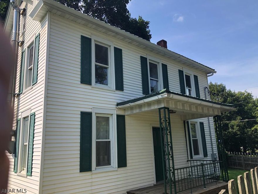 Newly updated 3 bedroom home on a nice corner, fenced lot. This home has all new flooring and fresh paint throughout. All brand new bath on the second floor. Bran new kitchen with cut out for breakfast bar, appliances included. There is a wood burning stove in the dining room to help keep heat costs low in the cooler months. New 200 amp breaker panel. Large storage shed, fenced corner lot, vinyl exterior, and metal roof. There is a deck and covered rear patio. Don't wait to schedule your showing on this great home.