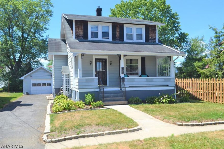 Charming 3 BR Garden Heights Home-Great appeal & aesthetics in this one! Entering the large living room character abounds with soothing colors paired with crown moulding & original woodwork that continues throughout the home. Dining room is good sized & has a pass through to the kitchen, which has GREAT cabinet space & is very appealing with newer tiled backsplash, tiled floors & lg chalkboard. Off this is a bright & cheery sunroom area that leads to the huge back deck for BBQs! Backyard provides an oasis of pretty landscaping & just the right amt of yard to use & maintain. Upstairs are 3 BRs & a trendy updated bath with white subway tile & wainscoting. Fin. area in basement too! Boiler (2015) & Hot Water Heater (2013). Detached garage & plenty of parking in drive. Lovingly cared for home!