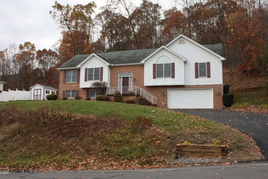 Immaculate 3BR/2.5BA home located in a private setting of Beverly Hills. This home is larger than it appears & is move in ready with all it's upgrades including newer carpet, front door, landscaping and more. Main level offering a spacious LR with cathedral ceilings - beautiful kitchen with oak cabinets, granite countertops, tile backsplash, gorgeous slate floor and ss appliances - family room with gas fireplace and french doors that lead out to the private back patio, great for entertaining & enjoying a beautiful view - Master BR with a unique Master Bath, you got to check this out!! - 2 additional BRs - Full BA - Laundry. Lower level has HUGE finished area - Half Bath with room to add a shower, utility/storage room and 22x26 garage.Call/Text to schedule your appointment!