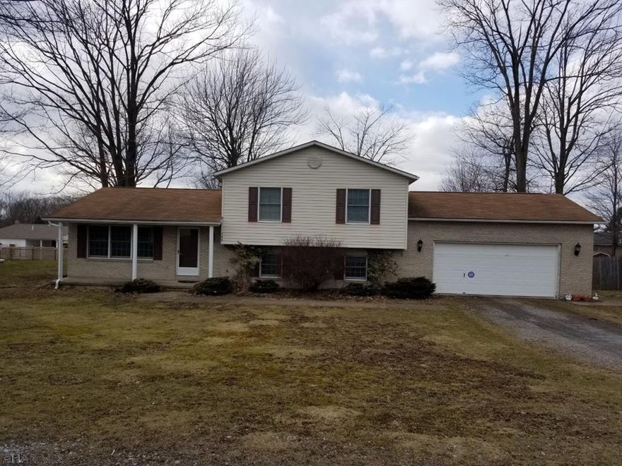 Sweet location just outside of town in a very nice neighborhood. New family room and 3/4 bath just recently completed in lower level. The rest of the house has fresh paint, and new flooring to be installed. Don't let this one pass you by, listed to sell quickly!