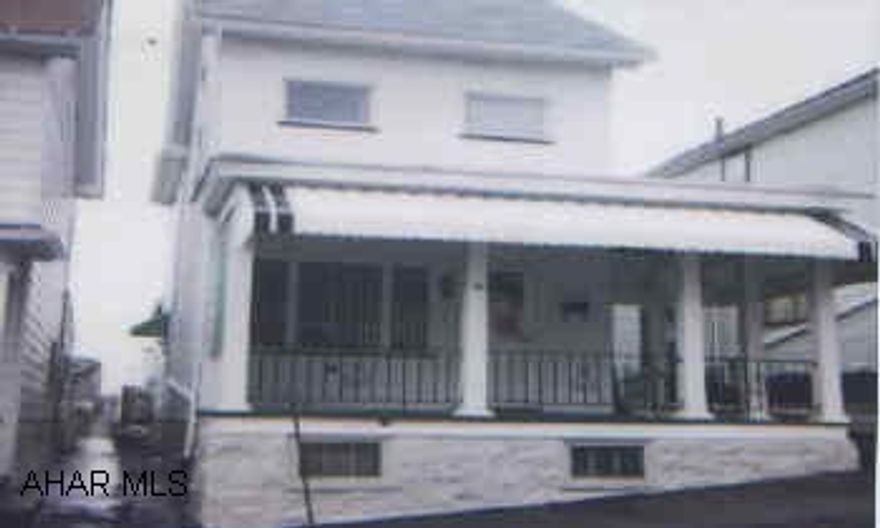 Lovely well kept 2 story home within walking distance of schools, huge living room, eat-in kitchen w/bar, wrap around porch, low taxes, motivated sellers.