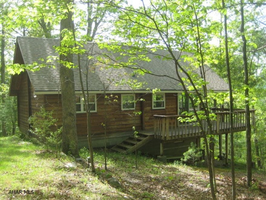 All cedar vacation home tucked away on a secluded 33 acres of woodland. Located near Green Ridge State forest, Rocky Gap, Chesapeake and Ohio Canal National Historic Park and state game lands. 1 mile from horseback riding and horse boarding. Minutes from hiking, hunting and camping. Located near swimming, fishing, and ATV trails. Rocky Gap Casino is within driving distance.