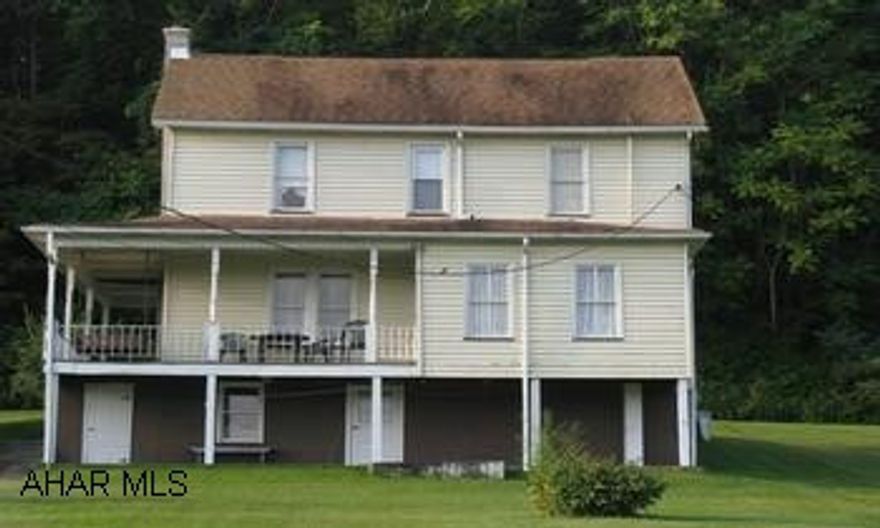 Two story, vinyl siding, good condition home on the edge of town. Quiet street with porches to enjoy views. Two-story home w/ vinyl siding and in good condition on the edge of town. Quiet street with porches to enjoy views.