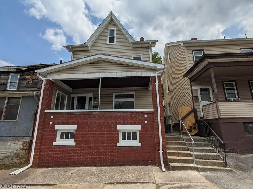 Outstanding total renovation. Just like new - top to bottom. High end appliances and large island in the stunning kitchen. Huge mudroom for boots, backpacks, everything. Alley access to off-street parking.