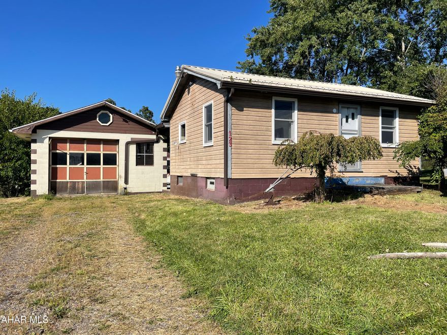 This ranch 2 BR 1 BA home in Freedom Township needs some TLC. Eat-in kitchen. Over sized one car garage. Beautiful .46 acre lot. Shed. Come take a look.