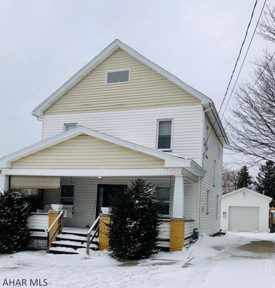 Step inside this spacious two story home, filled with character!  This home features original hardwood floors, some new windows, beautiful built-in cabinets in the LR, LR has brick ornamental fireplace, could put heater inside, new roof and other updates.  Large detached garage and a shed included.  This lovely 3 BR home also has a walk up attic for additional storage.  This is priced to sell!