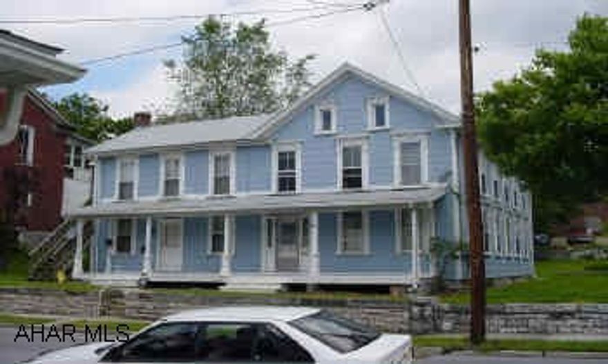 upgraded electrical, new roof, property well maintained,  Excellent opportunity for owner to live in large unit.  Currently vacant.  Both small units occupied. Well maintained 3 unit dwelling in downtown Roaring Spring.  Large 4 bedroom, 2 story unit with beautiful eat-in kitchen, lovely dining room and living room on 1st floor. Currently unoccupied. Great opportunity for new  owner to move right in.  Two smaller 1 bedroom units, one on 1st floor, one on 2nd floor, both currently occupied.  Off street parking.