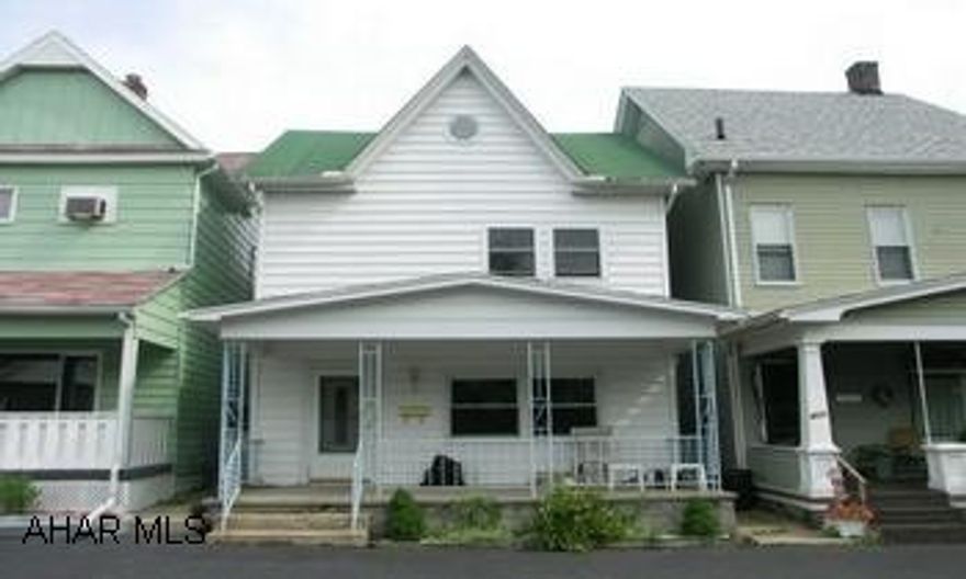 Ready to move in! Juniata Gap Elementary.  This 3 Bedroom also has a finished attic-fenced yard- detached garage-large eat-in kitchen-large rooms-freshly painted-some new thermo windows and large walk-in closets and good mechanics.  1st Floor Laundry.