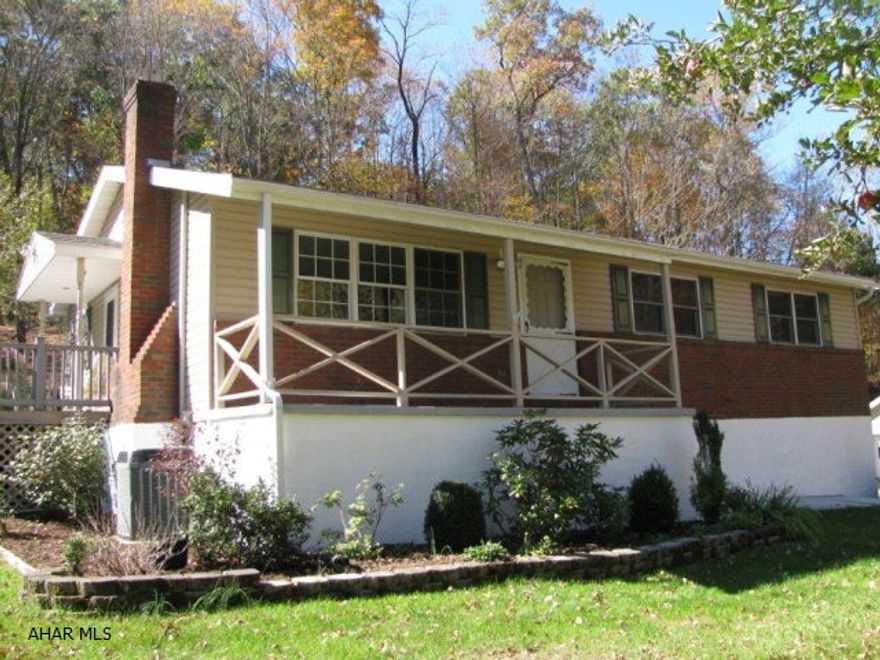 Privacy and Beauty surround this well cared for Bellwood Rancher on 1.87 acres! You'll stay cozy as you watch nature and wildlife from the gorgeous sunroom! The paver patio and walkways are surrounded with landscaping that blooms to life each spring! LR, DR, Oak EIK, 3 BR, & full bath complete the 1st Flr. Lower level offers a Family Room with wood burning fireplace and Bar & a bonus room! 1 car integral garage, a detached 18x20 garage and a shed too!