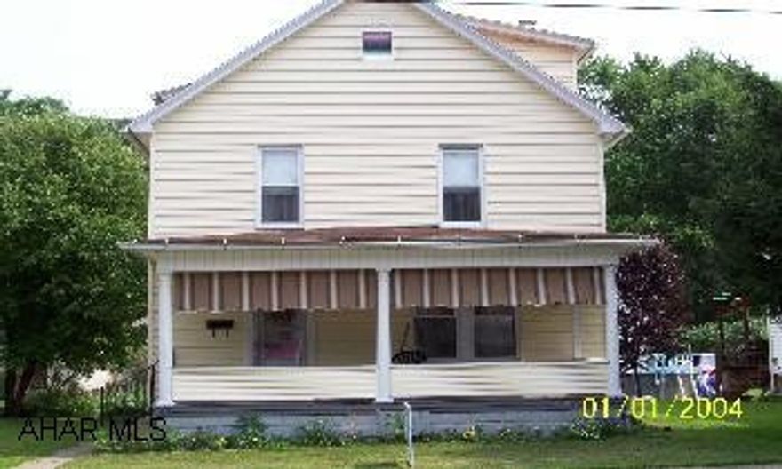 Large 2 story home with finished attic. Nice size yard w/1 car detached garage. A lot of original woodwork & charm. Basement has sump pump.
