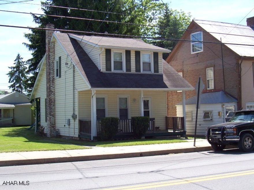 3 seperate homes on one parcel. Each residents has a off street parking place. Nice Yard.  Property well kept.