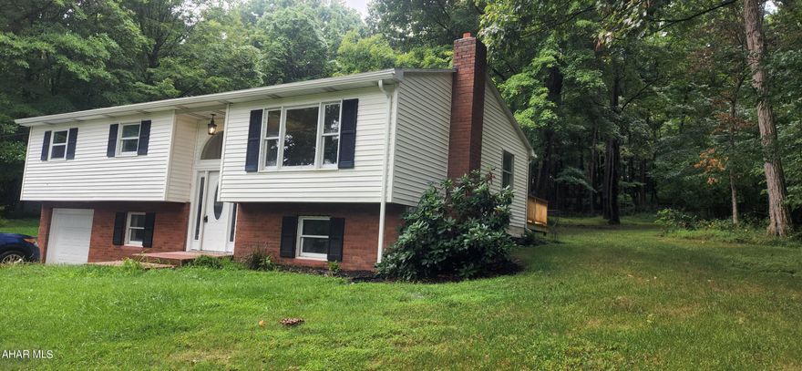 ***Back on the market at no fault of the seller***
Make this beautiful all updated home surrounded by woods become your new peaceful paradise.  Walk into the split entry and you will find all new flooring, granite countertops, stainless appliances, new bathrooms, all new paint, electric updated and new mini splits.  Enjoy the peacefulness and watch the wildlife while out on your new back deck.  Now head down the stairs to a beautiful family room with a newly added bathroom, laundry room with ample space to add an office. Need more space?  Go outside to a 23x23 bonus area with heat and AC, new windows, and French doors that leads out to the patio.  You can make this a home gym, entertainment area, rec room, or another family room to sit and enjoy life. Also there is an integral garage to park your car.  DID I MENTION?? This is a newly remodeled home!!  Call me today for your tour.