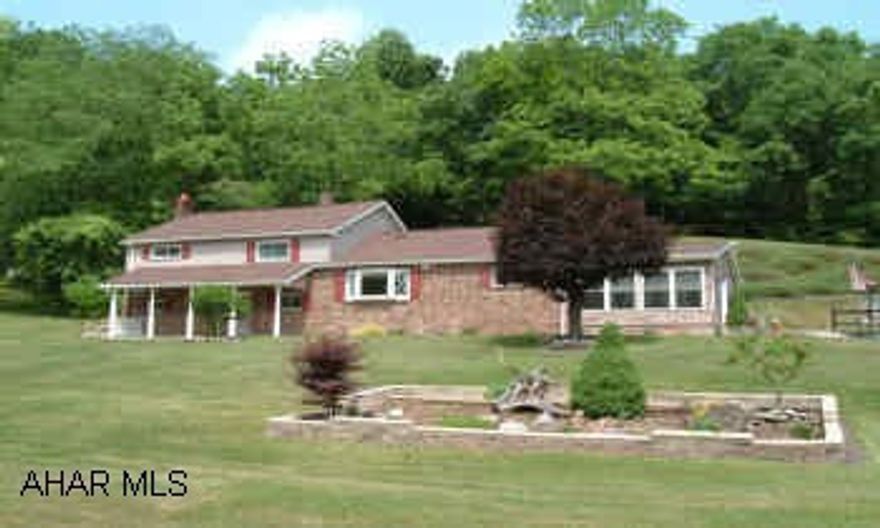 HASD home on .75 acres with 3 bedrooms,2 baths, Low Taxes, Private & Conveniently located Rural but convieniently located 3 bedroom home with large 2 car detached garage with 2nd floor  potential apartment or extra storage.