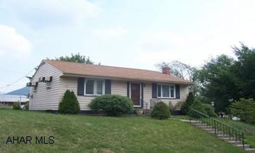 Cozy two bedroom ranch home. 1 car garage, modern kitchen, new central air conditioner, corner lot, fenced yard. Take a look.