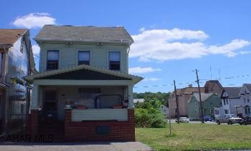 2 1/2 story frame Nicely cared for by these tenants, 3 bedroom, 2 baths, nursery off master bedroom.  Finished attic can be another bedroom (no heat).