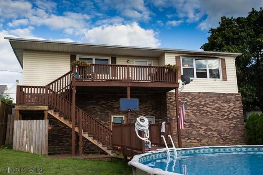 Raised Ranch home with a fenced yard, a pool, and a 3 car garage! 3 large bedrooms with 2 full bathrooms. A super large kitchen with loads of counter space, great appliances, and window light. No need to go to the basement for laundry either! Call the listing agent for a private tour today!