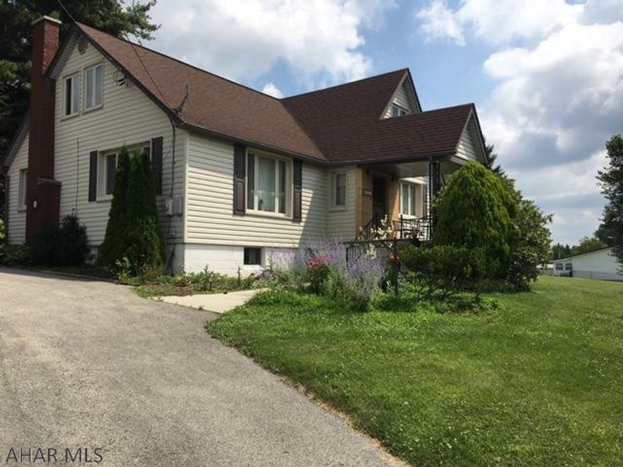 1.5 story vinyl sided home solid home on .65 acre secluded lot with 2 car garage,pavilion. Bonus rec room, kitchen and bath in the basement. A room on the 1st floor could be easily converted into a 3rd bedroom and there are already closets in the room.