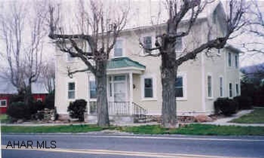 Charming 2 story traditonal . 3 BR in quaint historic Rainsburg. Home restored top to bottom. Includes new systems and roof. Sits on 3 lots. Large garage.