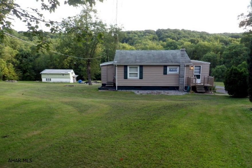 Logan Township - One Story - 113 Western Lane - $74900 - .52 Acre lot - 2 bedroom, 1 bath, living room, kitchen, dining area, computer room, basement laundry, family room with new electric, newer gas furnace and central air, outside access to storage under dining area, off street parking, taxes $477.00. 130 Western Lane - 2 story - $34,900 on an adjoining 1.35 acre lot with separate septic and public water. House needs REHAB. 2 bedroom, 1 bath, living room, kitchen, upstairs storage area, house on slab - shed and off street parking, taxes $487.00. Each house deeded separately.