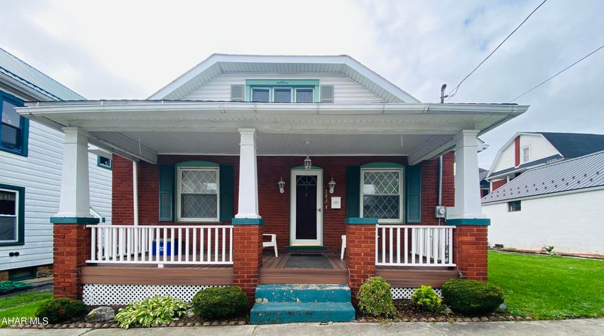 Come check out this adorable and inviting 2 bedroom brick home in Tyrone.  This home is move in ready with many great updates!  Newer roof, new composite front porch, privacy backyard with vinyl fence, beautiful refinished hardwood floors throughout the house, and quartz countertops in the kitchen. Large walk up attic is unfinished but can finish space and make your own. The fireplace is waiting for you to cozy up and enjoy all the house has to offer! Don't miss this one, call to schedule a tour today.