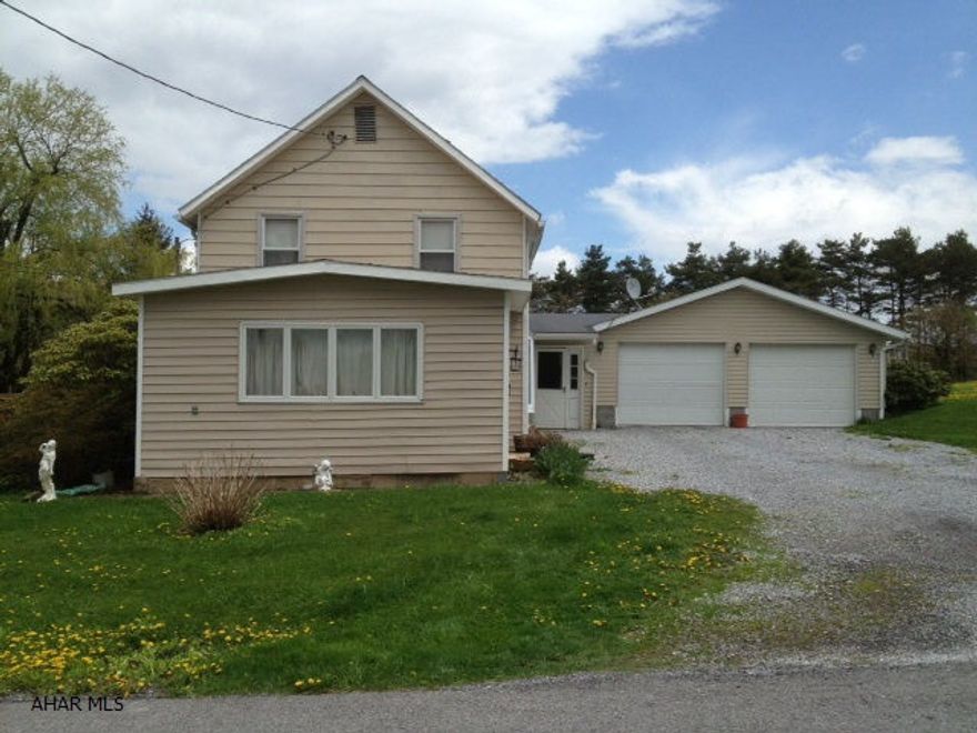Two story , 2 bedrooms, home on 3 acres in Cresson Township 2 car detached garage nice sun porch & deck. perfect country settings
