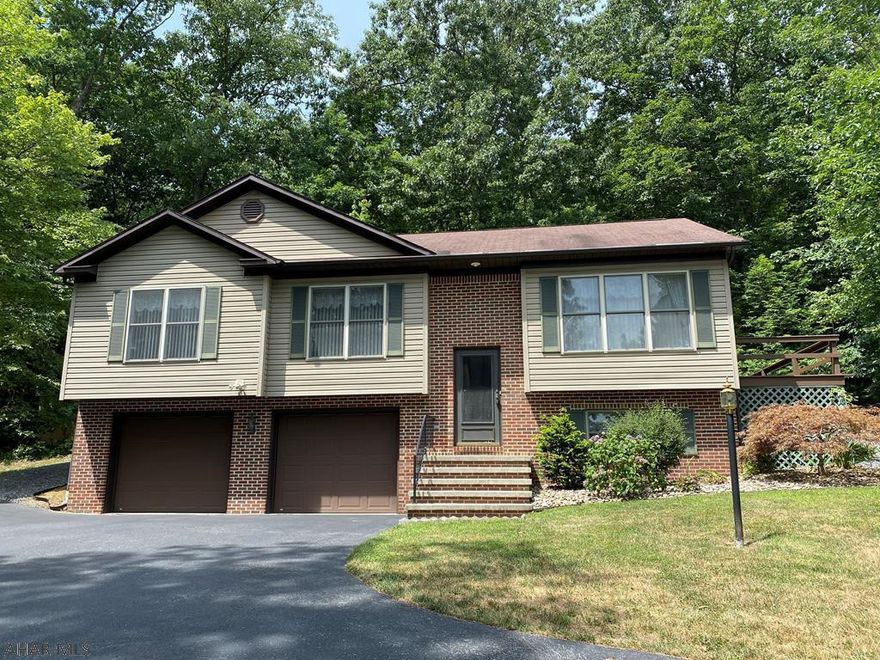 Peaceful country living close to town. Semi-wooded lot with a view. 4 Bedrooms, 2 full baths, 2 car garage.