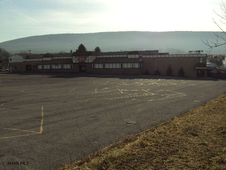 Pleasant Valley Recreation Center, Bowling, 32 lanes.  Also has 6 spaces rented to other businesses plus 2 apartments.  Restaurant lounge in lower level.  Lounge on main level.  Snack bar.  Much more over 31,000 sq ft.  Approx 2.7 acres total.  Zoned residential commercial.