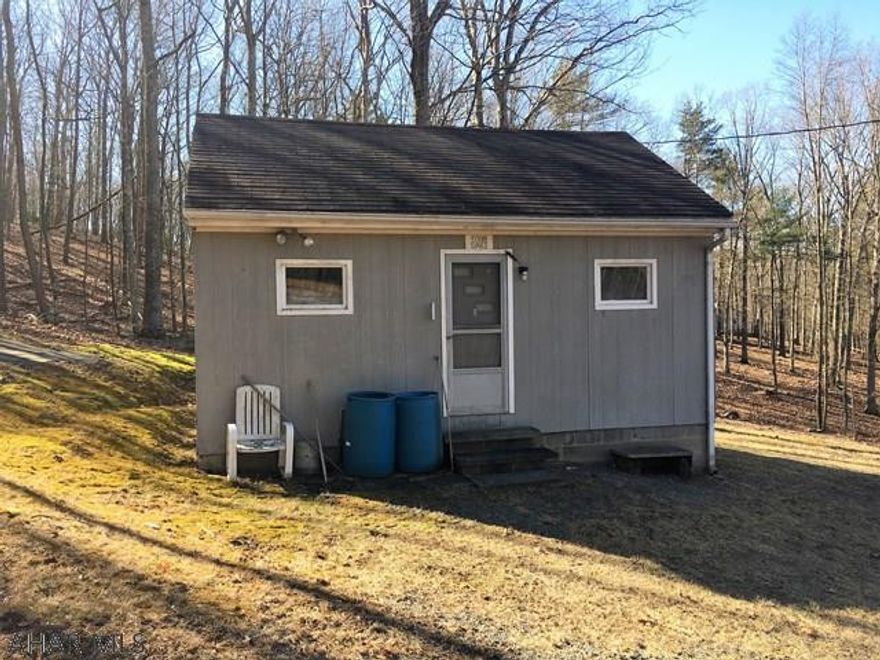 Nice getaway or hunting camp located minutes from 10,000 Plus acres of State Game Lands. Maryland State line and Rocky Gap Resort located less then 10 minutes away. Privy on property. SOLD AS-IS.