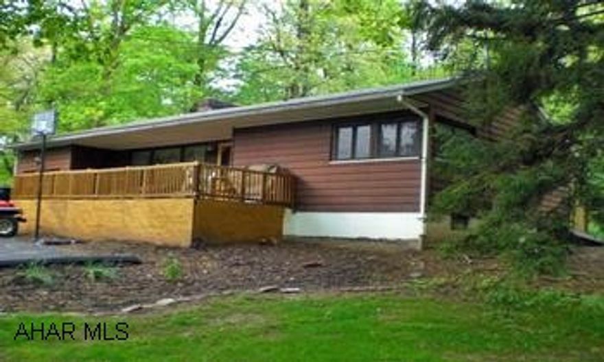 Sinken Valley ranch on 1.3 acres w/ LR., DR., 2BR., 1 new bath, hardwood floors, 2 fireplaces, kitchen w/ appliances Privacy and Comfort in this Sinking Valley ranch home on 1.3 acres w/ stream, LR., DR., w/ hardwood floors, & fireplace, kitchen w/ stainless appliances, new bath, 2 BR., wood/oil/ coal combo furnace, sunporch, deck, & pavilion to enjoy the view!