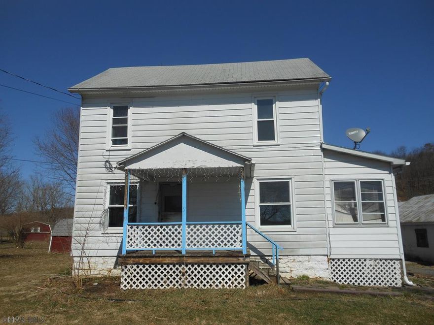 This is a two story home in Fishertown. This home has a 2 car detached garage and a driveway for parking. The main floor has an enclosed porch/mud room with no heat for entry, a kitchen, living room and dining room. The 2nd floor has three bedrooms and a full bath. This property is located in a flood zone. With some custom touches, this house could be your home