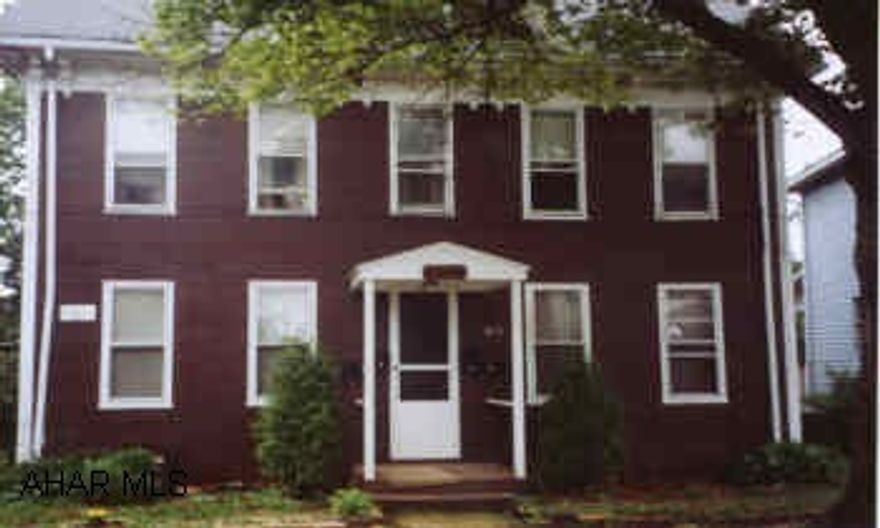 All seperate electric meters, owner pays heat, water, garbage and sewer for apt building. House tenant pays all utilities. Large 4 unit apartment building with 3 Br  house in rear. All showings must be set up with Louann Hoffman 24-48 notice tenant occupied.