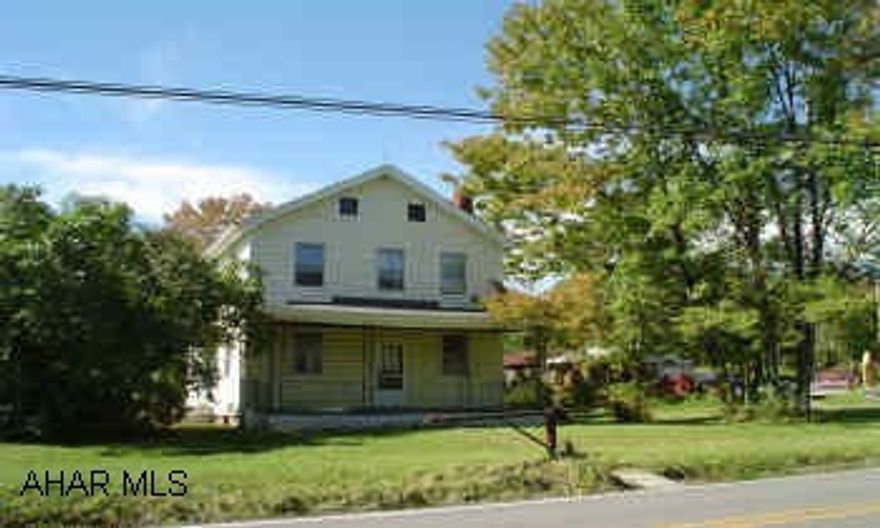 2 & 1/2 story frame house, 2 garages, shed. House needs extensive remodeling! No furnace, no electrical service panel, no radiators.