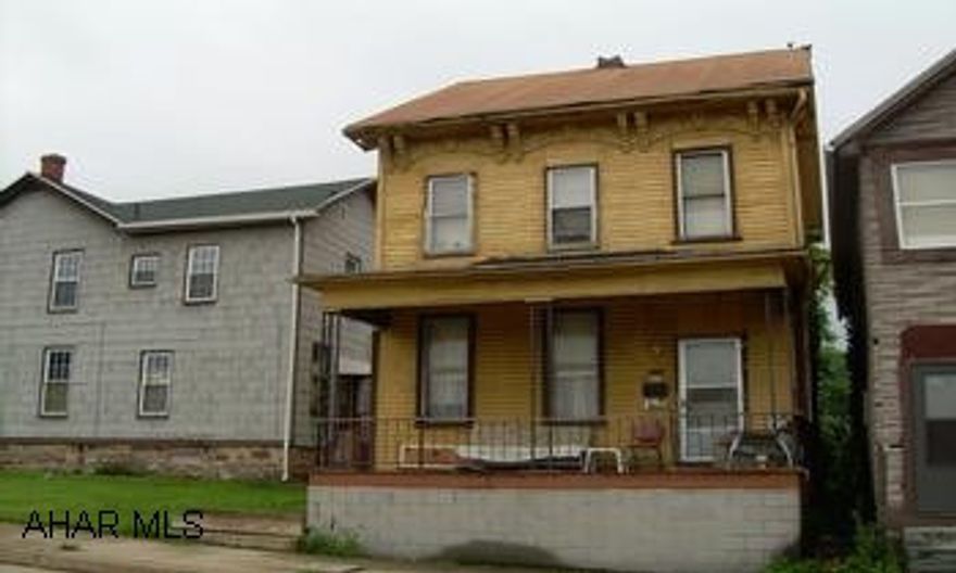 2 Story Frame Really must look inside!  2 Bedrooms, 1 Bath, Large eat in kitchen, Rear and Front Covered Porches.  Newer Furnace.  Tenant has occupied for years.  Good income producer!  2 Bed - 1 Bath - Finished 3rd Floor.  Rents @ $315 plus utilities.