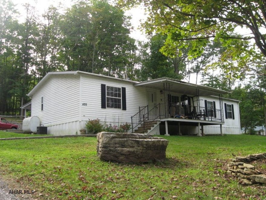 A well maintained 2001 Champion doublewide home on private 1/2 acre partially wooded lot. Vaulted ceiling.  Master with two large  closets and master bath. Covered front and back porch. 12X16 shed.