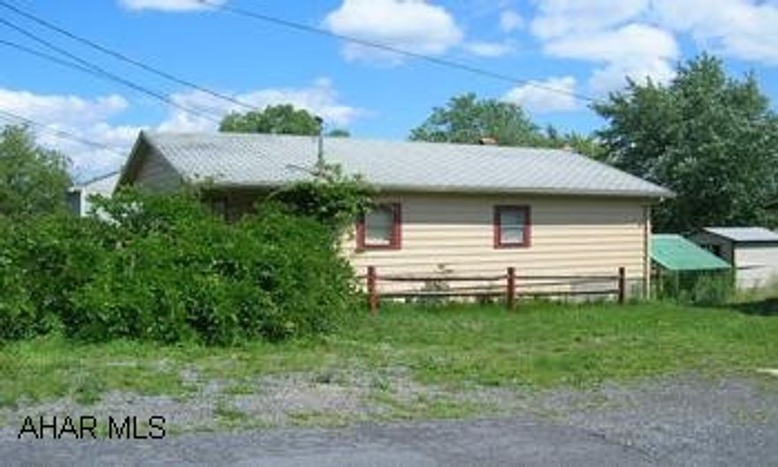 One BR Bungalow with FHA heat. Needs Work.