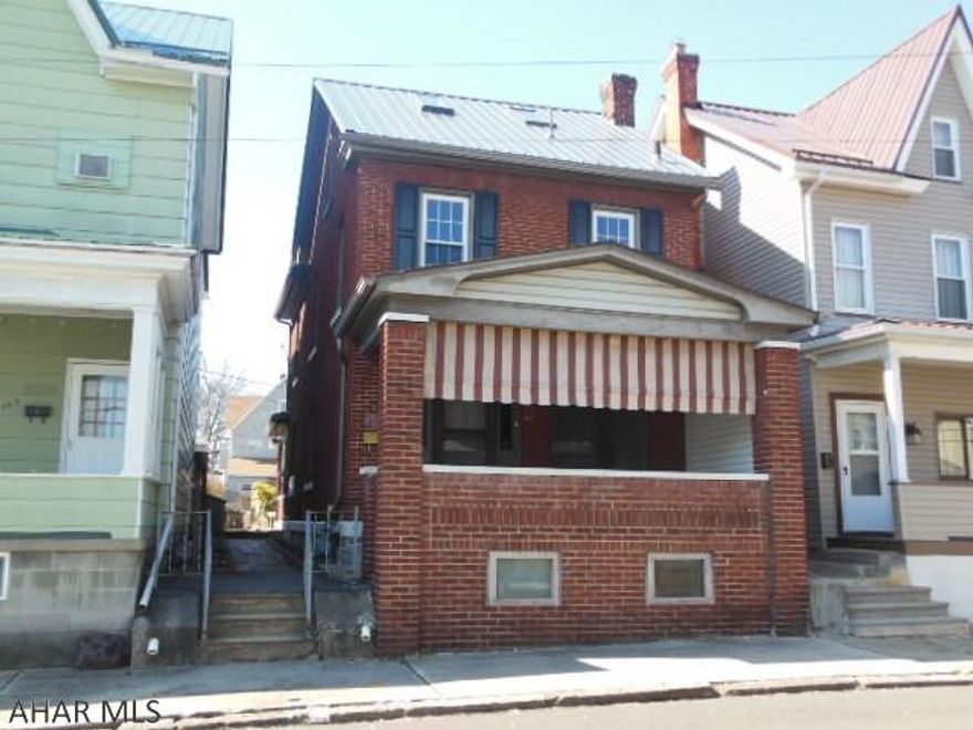 REDUCED!!  Solid, 2 1/2 story BRICK home with 3+ BR, 1.5 BA, updated electric service,boiler hot water heat, built in bookcases in LR and more. In an out-of-the-way location but close to main roads and has off street parking, also a little patio out back. Finished 3rd floor can be 4th BR. Gas hot water boiler (Utica) is newer, 1/2 BA is in a large basement. Updated windows (thermopane) Great location!  Off-street parking in the rear.  Handy to I99 and shopping!  FRESH PAINT, NEW ROOF only days old!  *Floor-door in back porch for basement.  Call listing agent for your personal showing...