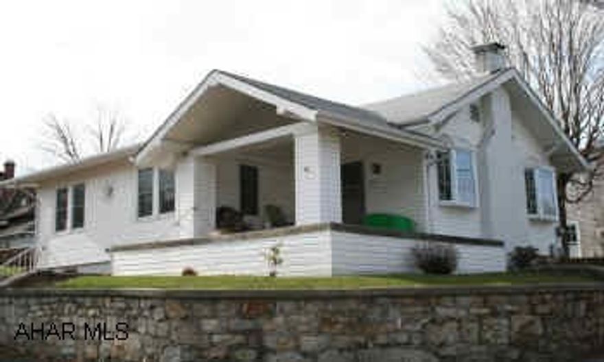 Hardwood floors, high ceilings w/crown molding, bay windows in LR, built-in corner cupboard in DR, 2Br, 1 full bath, 1 3/4 bath, partially finished basement.Outdoor deck area has fantastic view of the golf course and mountains.