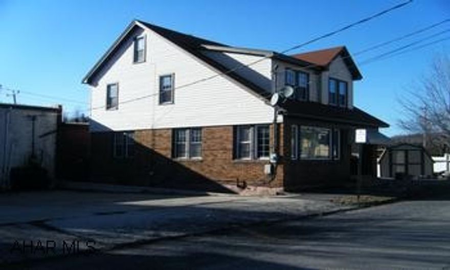 2 story home, reconditioned. Move in condition. Lot is 30x50 with adjacent 40x120 lot. New carpeting. Owner financing. Owner is a saving and loan. To a qualified buyer-5% down payment, 4.5%interest, 30 year term. Reduced closing costs, quick closing. You can still qualify for the 10% tax credit offered by Uncle Sam under current guidelines. Must act soon to hit deadlines. Home is on a lot 30x50. The adjacent lot is lawn and fenced 40x120.