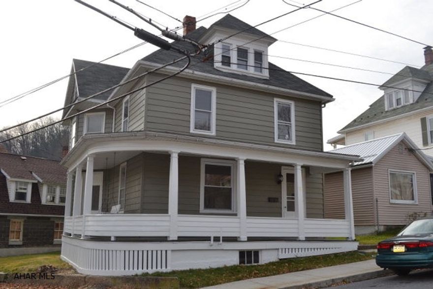 PRICED TO SELL.  Updates throughout this turn of century home.  Granite kitchen with new stainless apliances. Spacious living areas, hardwood flooring, original woodworking, freshly painted inside and out.  Fully finished 3rd floor with new carpet in bedrooms. 2nd floor laundry w/ washer and dryer included.  Not going to last, be sure to call today!