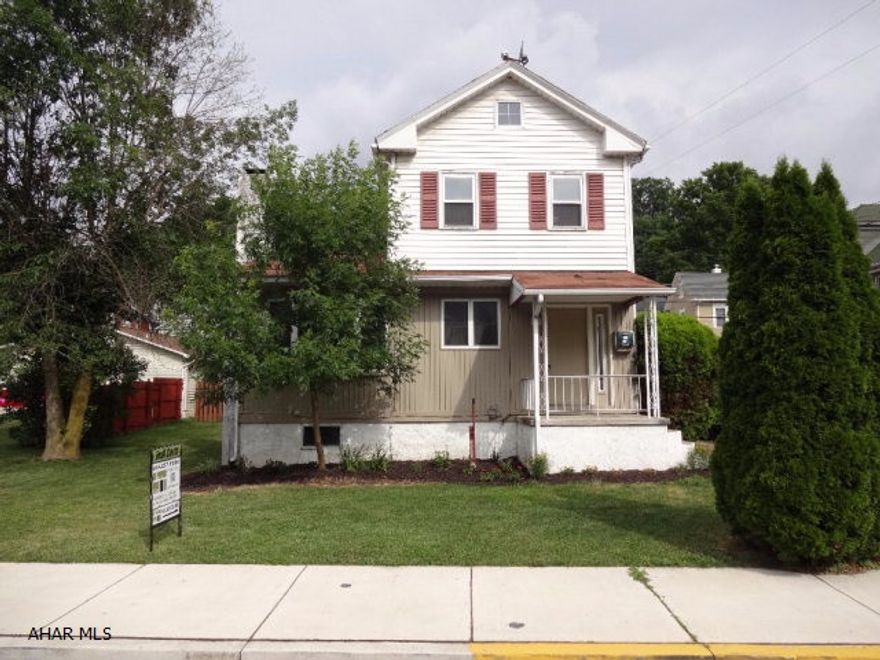 Step into this freshly painted move-in ready home in the borough of Tyrone and experience an open floor plan complete with a stone fireplace, bright bay window, spiral staircase, and new laminate floors.  The kitchen has updated custom countertops, new flooring, and an efficient natural gas range.  On the second floor you will find new carpet throughout and freshly painted bedrooms, both with ceiling fan lights; and in the bathroom, updated vinyl flooring, new toilet, and an easy-to-clean one-piece shower/bath unit.   The house is comfortably located on a corner lot with nice landscaping, providing a pleasant curb appeal, and a freshly painted deck out back, while the Park Avenue Playground is nearby.