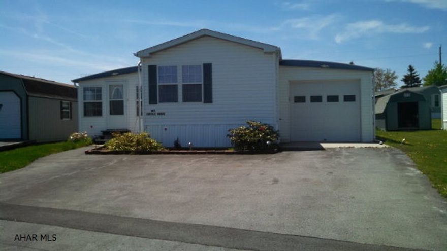 Very unique mobile home in Ebensburg's (55 and older) Wise's Trailer Park. Attached 33' x 11' garage, 11' x 11' workshop or storage area, 30' x 11' sunroom, 16' x 11' office, paved parking for 3-4 cars. Lot rent is $225.00 and includes water/sewer/trash. Lot rent will be discounted by $20.00 if paid by the 5th of the month.