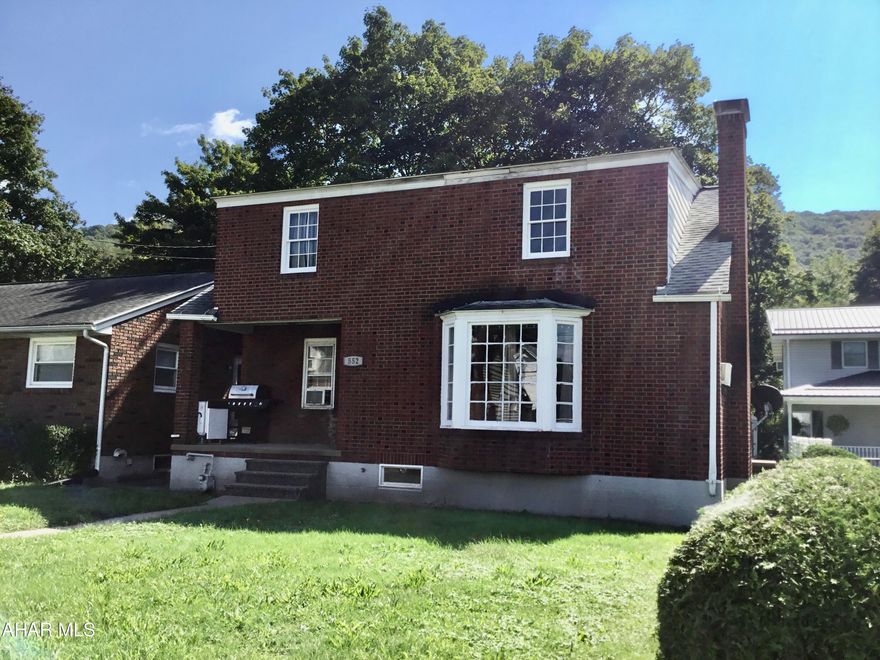 One and a half story brick home, 4 beds and off-street parking in rear.  Newer Furnace and updated bathroom.  Measurements may not conform to ANSI practice of standards.  Sq Ft and Taxes per tax card buyer to verify.