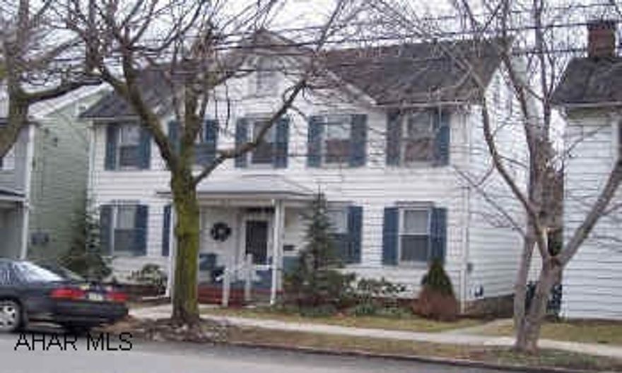 2 story frame house new windows, newer oak kitchen, hardwood floors, oil hot water heat in town location
