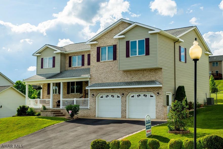 CHECK OUT THE NEW PICTURES!   Ready to move into a cozy neighborhood to a fantastic 5 bedroom home that is close to all of your needs?  This beautiful, well cared for home is ready for you.   Solid oak doors and cabinets, granite and quartz countertops, new stainless appliances, the list of updates goes on.  Spacious master suite with large private bath as well as a main bath with a double sink and a vanity area. No lack of storage space either, with every nook available including convenient attic storage above the garage.  Finally, enjoy relaxing on the large rear deck, savor the mountain views from the covered front porch or unwind at the Quince Court park with basketball and  tennis courts a short walk away.  With low utility costs (see "other" document) this is a must see home.