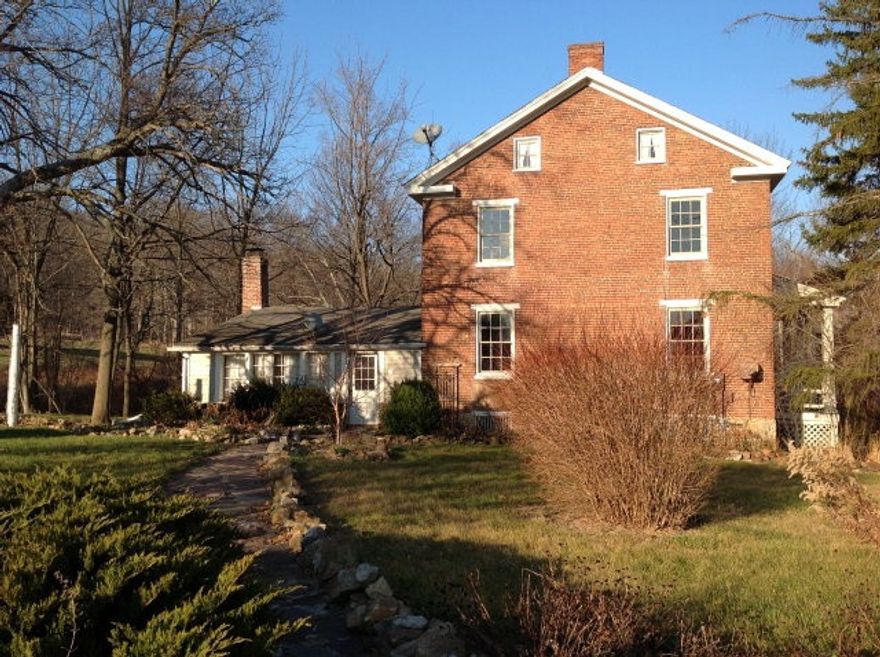 INCREDIBLE LOW PRICE!!!! Beautiful, unique historic home built in the 1800's.  With plenty of charm and endless possibilities.  This home is almost move-in ready in need of finished bathrooms. Toilet and plumbing hook ups are there. New 200 amp electric service.  Beautiful finished wooden floors throughout and spacious rooms with high ceilings. Newer furnace and hot water heater. Nicely landscaped nestled on 1.6 acres. Walk up attic with a 3/4 bath and storage. Outside pole building. Only minutes to Bedford and 25 minutes to Cumberland MD.